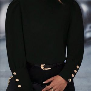 Elegant blouse. Black with gold buttons. Size 1xl.